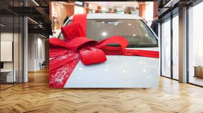 The white car with red bow Wall mural