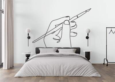 One Line art hand holding brush. Minimalist Continuous Line  artist logo Wall mural