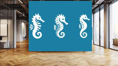 Sea Horse. Beautiful simple modern logo, icon set. Various white colors on a blue background Wall mural