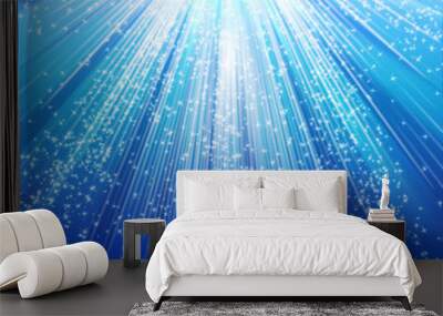 snowflakes and stars descending on a path of blue light Wall mural