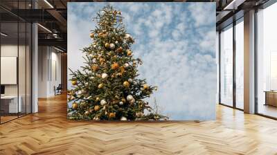 Christmas tree on the city streets Wall mural