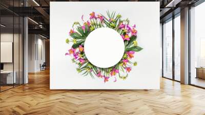 Summer tropical round flowers composition frame with palm leaves on white background Wall mural