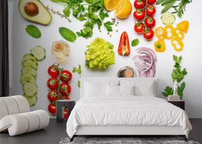 Various salad vegetables ingredients on white background, top view, flat lay. Healthy clean eating or diet food concept. Wall mural