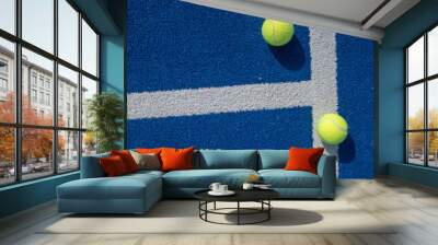 blue paddle tennis court, two balls next to the line Wall mural