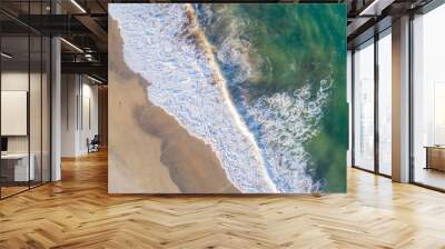 shore of a beach at sunrise, overhead view with drone Wall mural