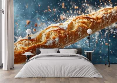 A freshly baked baguette captured in mid-air, with a dramatic effect as crumbs scatter against a dark background. The crusty texture and golden color of the bread are highlighted, evoking the aroma Wall mural