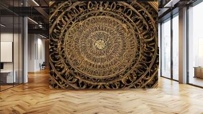 An ornate golden mandala featuring intricate details and glowing effects, radiating a sense of elegance and mysticism. The symmetrical design and rich gold tones create a captivating visual Wall mural