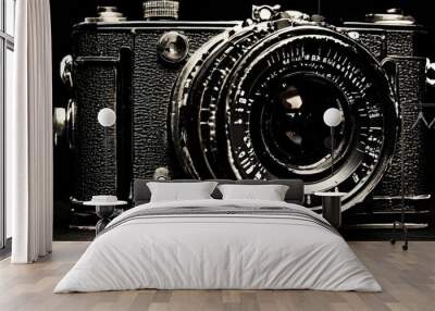 Close-up of a vintage black and white camera showcasing its intricate lens details. The classic design and textured surface evoke a sense of nostalgia and appreciation for traditional photography Wall mural