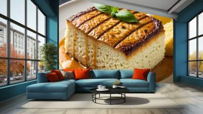 Delicious gourmet tofu steak garnished with fresh basil and lemon slices, served on a plate with a savory sauce, perfect for a healthy and appetizing meal presentation. Wall mural