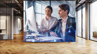 Businessman and businesswoman in formal wear working together to optimize business process by applying new technologies. Hi tech holograms over modern office background with panoramic windows Wall mural