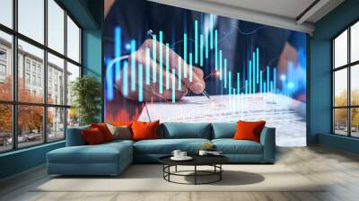 Businessman in suit signs contract. Double exposure with forex graph hologram. Man signing brokerage agreement. Financial market analysis and investment concept. Wall mural