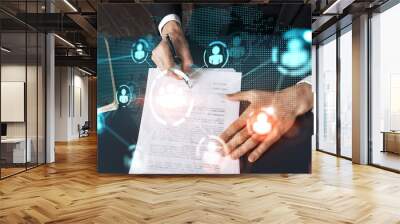 Businessman in suit signs contract. Double exposure with social media and planet hologram. Man signing agreement on research. People network concept. Wall mural