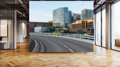 Empty urban asphalt road exterior with city buildings background. New modern highway concrete construction. Concept of way to success. Transportation logistic industry fast delivery. Boston. USA. Wall mural