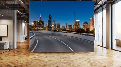 Empty urban asphalt road exterior with city buildings background. New modern highway concrete construction. Concept of way to success. Transportation logistic industry fast delivery. Chicago. USA. Wall mural