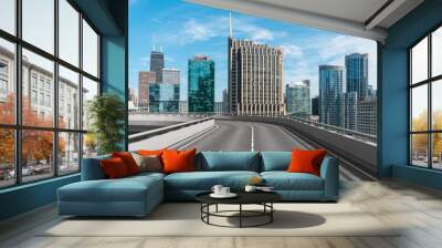 Empty urban asphalt road exterior with city buildings background. New modern highway concrete construction. Concept of way to success. Transportation logistic industry fast delivery. Chicago. USA. Wall mural