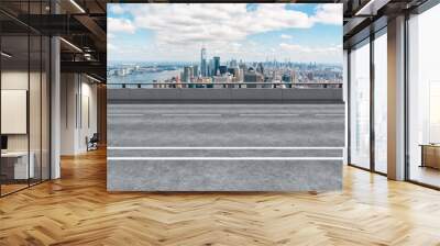 Empty urban asphalt road exterior with city buildings background. New modern highway concrete construction. Concept of way to success. Transportation logistic industry fast delivery. New York. USA. Wall mural