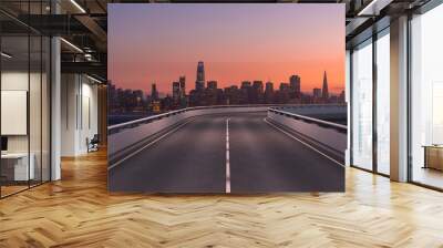 Empty urban asphalt road exterior with city buildings background. New modern highway concrete construction. Concept way to success. Transportation logistic industry fast delivery. San Francisco. USA. Wall mural