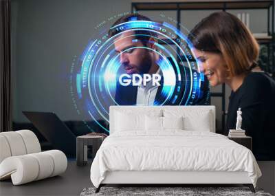 GDPR concept with two people working on laptops in an office setting. Wall mural