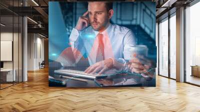 Two colleagues in formal wear working together to optimize trading strategy at corporate finance fund. Forex chart hologram over modern office background Wall mural