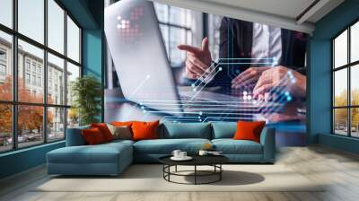 Two information technology specialist brainstorming on project to create a new approach to develop software to improve business service. Working with laptop. Tech hologram icons. Wall mural