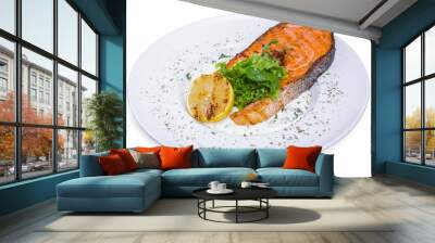 Grilled salmon steak with spinach in white plate, top view Wall mural