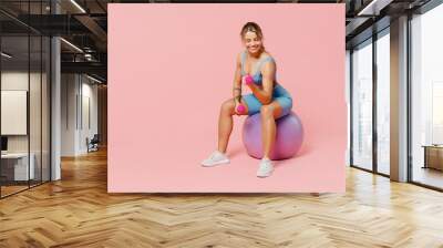 full length young strong sporty athletic fitness trainer instructor woman wear blue tracksuit spend  Wall mural