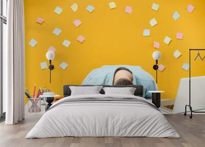 Young sad tired exhausted frustrated sick ill sleepy employee business man in shirt sit work at white office desk with pc laptop sleep put head on table isolated on yellow background studio portrait. Wall mural