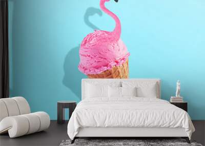 Pink flamingo in ice cream waffle cone. Minimal abstract caribbean concept of summer and vacation in the tropics by the sea, a trendy collage on a blue background.Creative art minimal aesthetic Wall mural