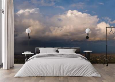 The stormy clouds on sunset panorama Wall mural