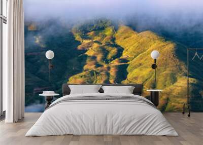 Ta Xua is a famous mountain range in northern Vietnam. All year round, the mountain rises above the clouds creating cloud inversions. Wall mural