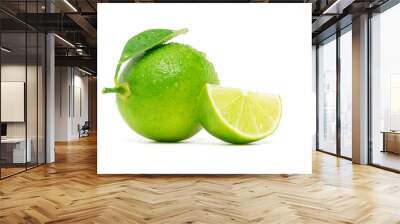 Natural fresh lime cut sliced with green leaf and water drop isolated on white background with clipping path Wall mural