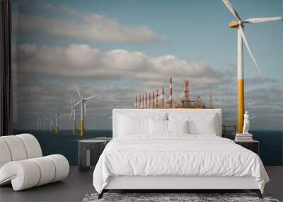 Offshore oil and gas production petroleum pipeline and wind turbine in the sea. Wall mural