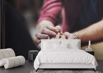 Heartfelt hands. Cropped shot of two people holding hands in comfort. Wall mural