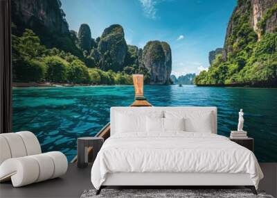 A boat travels across calm blue water Wall mural