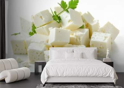 A collection of cheese cubes garnished with fresh parsley, ideal for food photography or culinary concepts Wall mural