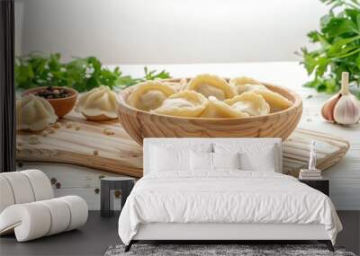 A traditional wooden bowl filled with steaming hot dumplings placed on a rustic cutting board Wall mural