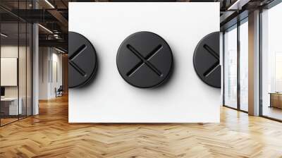 Close-up of three black buttons on a white background Wall mural