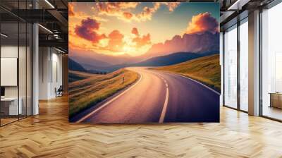 Dolomites, Italy. Colorful sunset along the mountain road. Beautiful curved road with rocks, stones and clouds. Spring with a lone highway going over a mountain pass. Wall mural