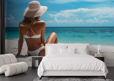 Beautiful woman sitting on the paradise beach. Vacation, travel concept.  Wall mural