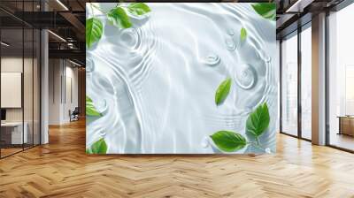 White background with water ripples and green leaves. Wall mural