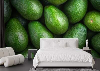  A pile of green avocados atop another pile Wall mural