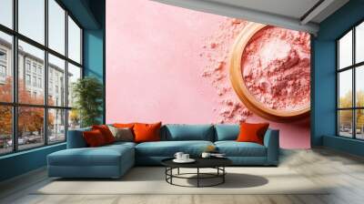  A tight shot of powder in a wooden bowl against a pink backdrop, a feather hovering nearby Wall mural