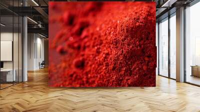  A wooden table holds two piles of red powder Wall mural