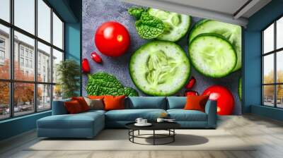  Cucumber slices, tomatoes, and green lettuce leafily arranged on a gray background ..Or, if you prefer to keep the original word Wall mural