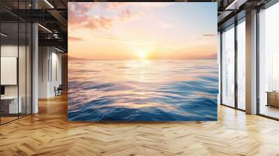  The sun sets over the ocean, painting a small island mid-frame in hues of gold, while scattered clouds tinge the sky pink and orange Wall mural