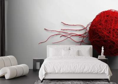  Two red balls of yarn atop white walls Wall mural