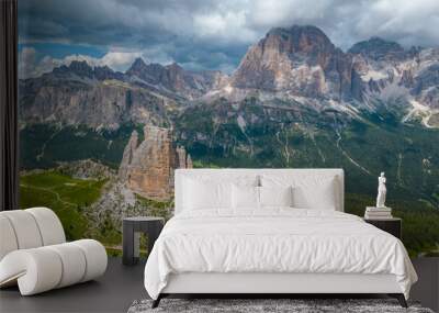 An aerial view of the incredible Cinque Torri mountains in the Dolomites, Italy, captured by a drone. This breathtaking shot showcases the dramatic rock formations and rugged beauty of  mountains Wall mural