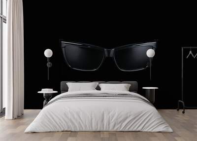 Black classic sunglasses on a black background Wall mural