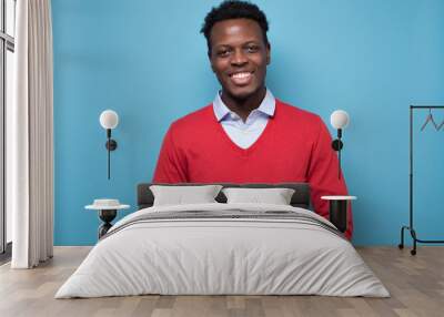 Portrait of a african smiling young man. Wall mural