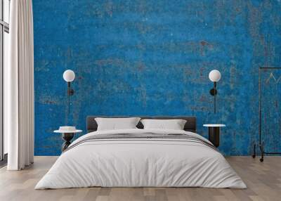 Old shabby painted blue metal surface background. Wall mural